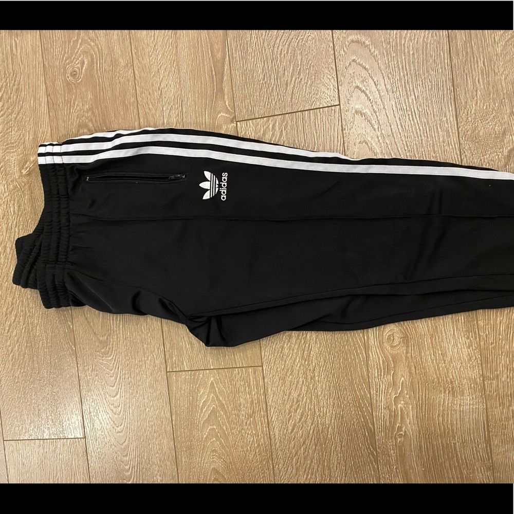 Adidas nylon track pant tapered ankle style. Small